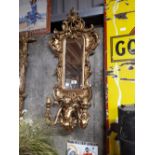 Gilt pier mirror in the Rocco style.