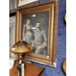 19th C. gilt framed print of a Gentleman and Lady.