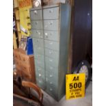 Pair of 1940s metal office filing cabinets with fold down doors.