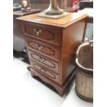 Single mahogany four draw bedside locker.