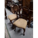 Pair of Victorian mahogany side chairs with cabriole legs.