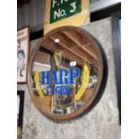 Large Harp lager framed advertising mirror in the form of a barrel.