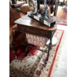 Victorian rosewood sewing table with single draw in the freeze.