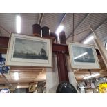 Two large framed navy prints.