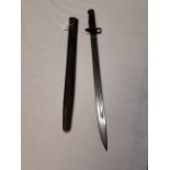 19th. C. rifle bayonet with leather scabbard.