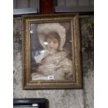 Gilt framed print of a young girl.