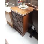 Single mahogany three draw bedside locker.