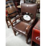 19th C. oak and leather arm chair.
