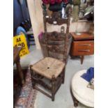 Pair of carved oak hall chairs.