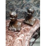 Pair of bronzed models of boys.