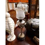 Victorian oil lamp with clear glass bowl and etched tulip shade.