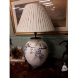 Pair of porcelain table lamps decorated with wisteria.