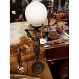 Art Deco styled packed bronze figurine in the form of a lamp