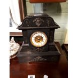 19th C. slate mantle clock with brass mounts.