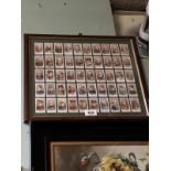 Set of framed cigarette cards depicting Military Personnel.