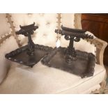 Pair of cast iron foot scrappers.