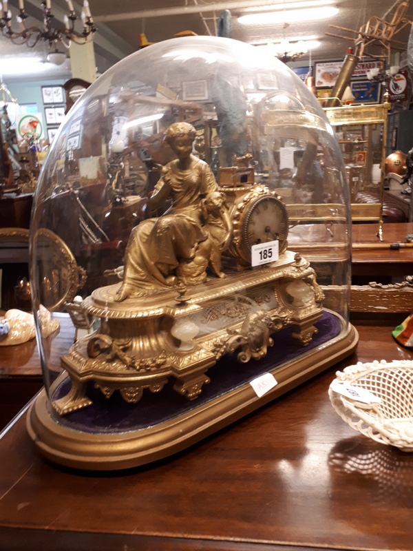 19th. C. gilded metal French clock in original glass dome.