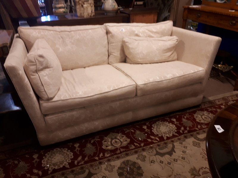 Upholstered two seater couch.