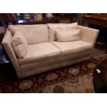 Upholstered two seater couch.