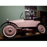 Vintage child's pedal car.