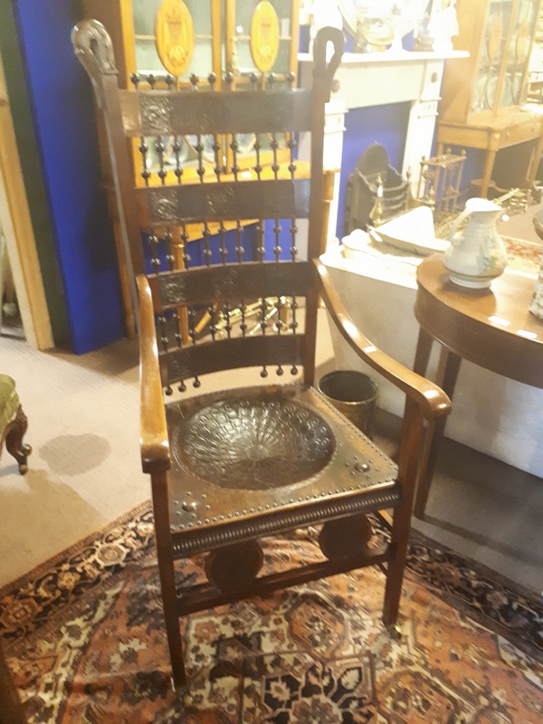 Mahogany open armchair in the Mackintosh style.