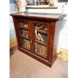 Regency mahogany dwarf bookcase the two doors inset with brass grills. { 95cm H X 115cm W X 35cm D}.