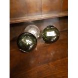 Three early 20th C. glass buoys.