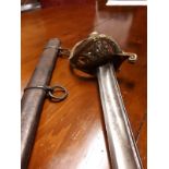 19th. C. French basket hilt sword in original metal scabbard.