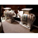 Pair of ceramic plant stands in the form of elephants in the Oriental style.