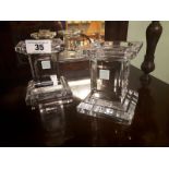 Pair of LOUISE KENNEDY Tipperary crystal candlesticks and a cut glass bowl.