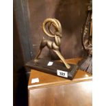 Art Deco gilded metal figure of a ram on oak base.