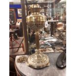 Victorian brass table lamp with tulip shade.