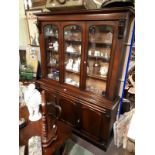 Victorian mahogany bookcase the three glazed doors above three blind doors.