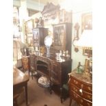 Victorian rosewood chiffonier the shaped mirror flanked by two astragal glazed doors over a centre