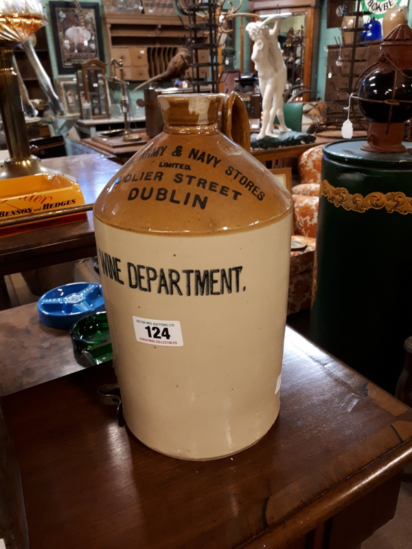 JUNIOR ARMY AND NAVY STORES DUBLIN Wine Department stone ware flagon.