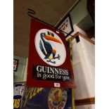 Guinness is Good For You double sided enamel advertisement.