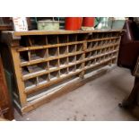 1930's beech work bench with pigeon holes. { 82cm H X 210cm L X 65cm D }.