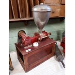 Rare early 20th C. coffee grinder with mahogany base.