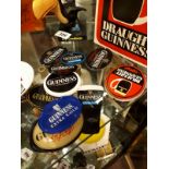 Collection of Guinness badges.