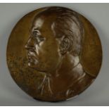 Placca in bronzo raff. ''MUSSOLINI''. Firmata L. MARTINI a sinistra. Anni '30-'40. Mis. Diam. cm. 28