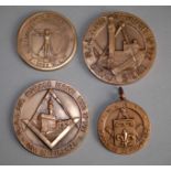 Quattro medaglie massoniche in bronzo. XX secolo.