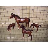 FOUR BESWICK BROWN GLOSS HORSES