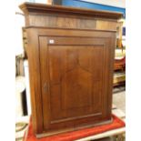 GEORGE III OAK HANGING CORNER CUPBOARD,