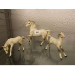 THREE BESWICK GREY GLOSS HORSE AND FOALS