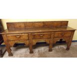 EARLY 18TH CENTURY OAK DRESSER BASE WITH THREE DEEP FRIEZE DRAWERS,