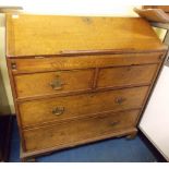 MID 18TH CENTURY OAK BUREAU FITTED TWO SHORT OVER TWO LONG DRAWERS ON BRACKET FEET