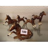 FIVE BESWICK GLOSS FOALS -RECUMBENT AND OUTSTRETCHED LEGS