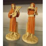 PAIR OF ROYAL WORCESTER EGYPTIAN MUSICIAN FIGURES PUCE MARK AND NUMBERS 1084