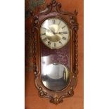 CARVED FRET CASED WALNUT WALL CLOCK