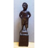 SMALL BRONZE FIGURE OF A BOY WEARING A HAT ON BASE